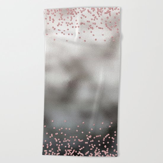 Rosegold pink glitter confetti on silver metal background Beach Towel