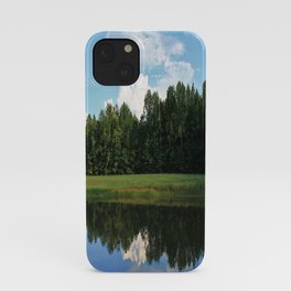 Clouds over a pond iPhone Case