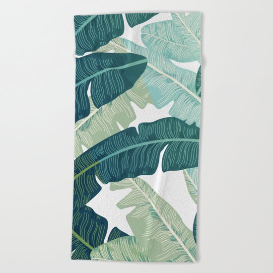 Tropical oasis Beach Towel