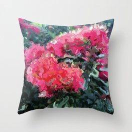 Red flower blossoms amid lush green foliage Throw Pillow