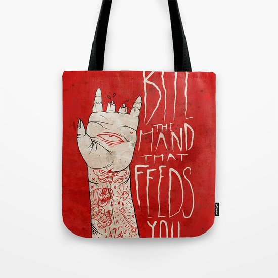 bite the hand. Tote Bag