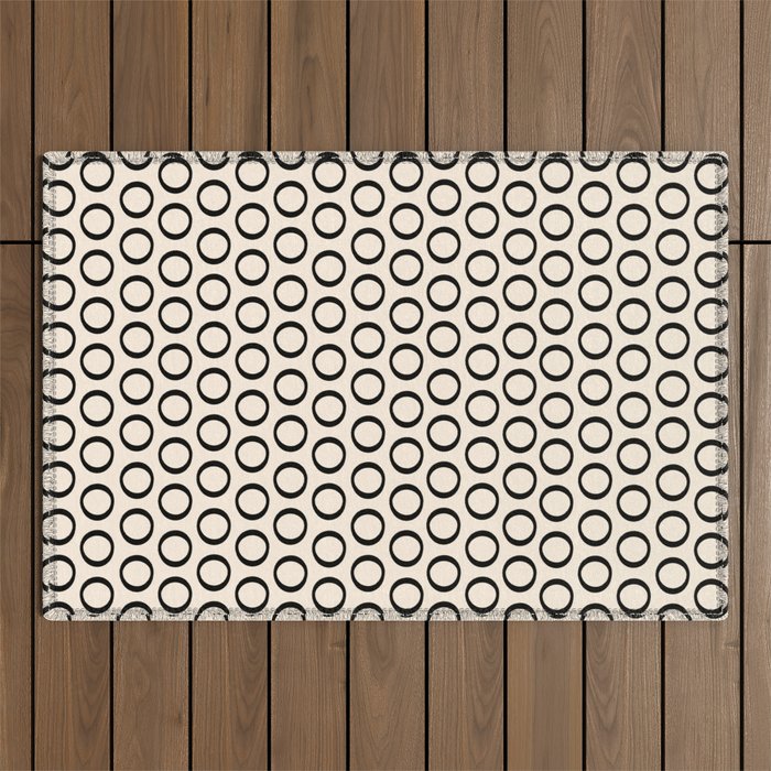 Inky Dots Minimalist Pattern 3 in Black and Almond Cream Outdoor Rug