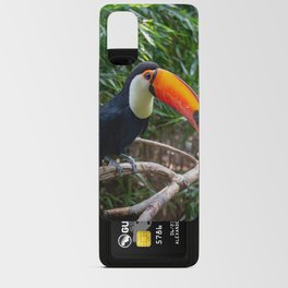 A toucan laid on a tree branch in the forest Android Card Case