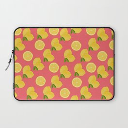 Fresh whole lemons and slices on a raspberry background Laptop Sleeve