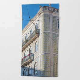 Round corner building in Lisbon, Portugal - green and yellow azulejos - summer street and travel photography Beach Towel