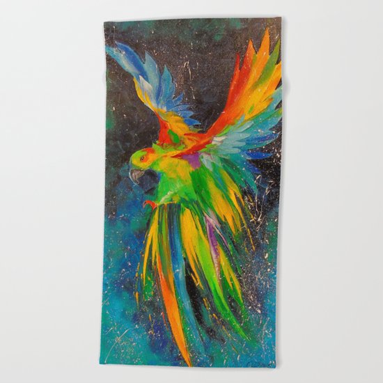 Parrot in flight Beach Towel