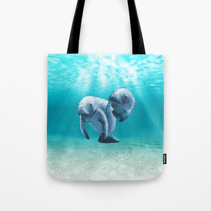 Two Manatees Swimming Tote Bag