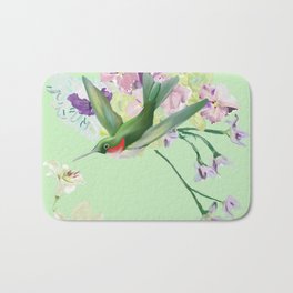 Hummingbird on mint green Bath Mat