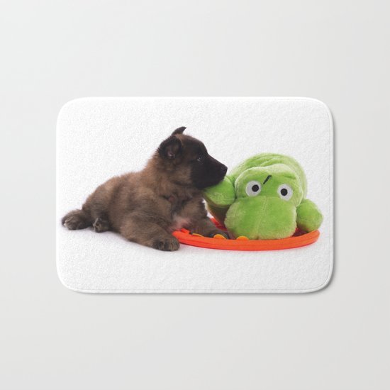 Puppy cuddling green toy Bath Mat