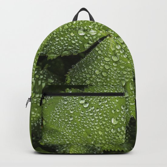 Water drops on fresh green Leaf Backpack