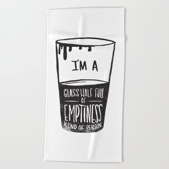 glass half full of emptiness Beach Towel