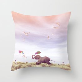 Elephant running after a kite Throw Pillow