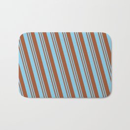 [ Thumbnail: Sky Blue & Sienna Colored Lined/Striped Pattern Bath Mat ]