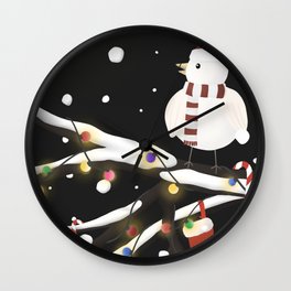 Lonely Bird on a snowy Christmas night Wall Clock