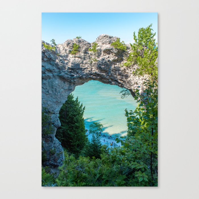Looking at Lake Michigan through Arch Rock on Mackinac Island in Michigan Canvas Print