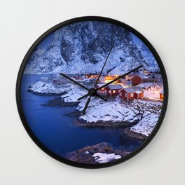 Norwegian fisherman's cabins on the Lofoten at dawn in winter Wall Clock