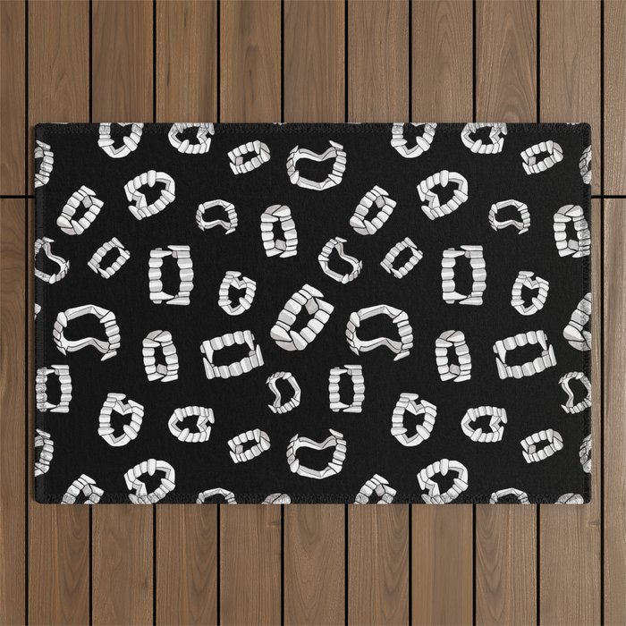 Take a bite out of life - Vampire fangs on black Outdoor Rug