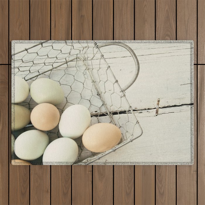 Eggs in one basket Outdoor Rug