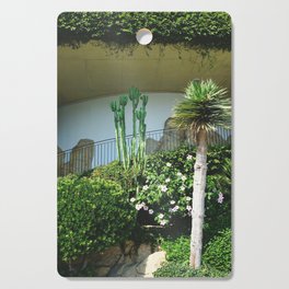 Pretty garden in French Riviera | Cactus, Hibiscus flowers and palm tree Cutting Board