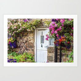 Colorful country house with flowers Art Print | Cottage, Colourful, Photo, Door, Green, Hangingbaskets, Color, White, Bright, Flowers 