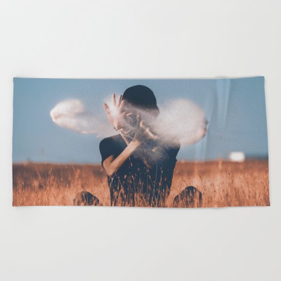 The magician Beach Towel