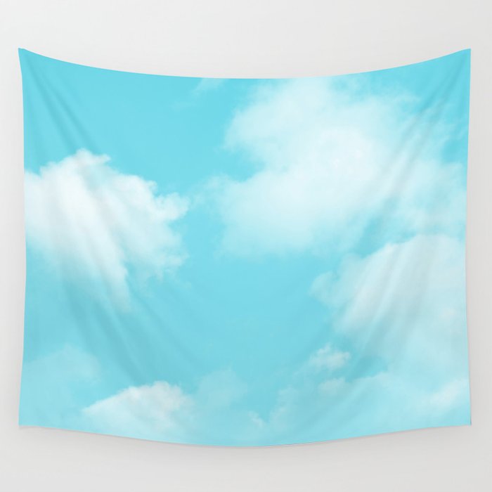 Cute puffy small white clouds on a sunny aqua blue sky Wall Tapestry