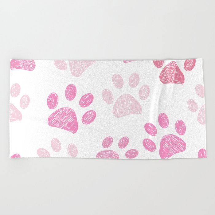 Pink colored paw print background Beach Towel