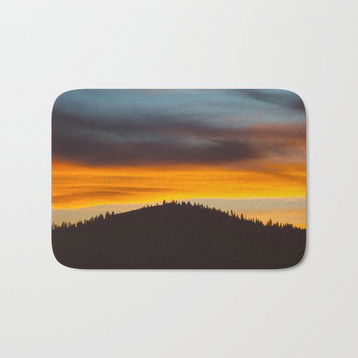 Mountain Hill With Trees Orange And Blue Sunset Clouds Bath Mat