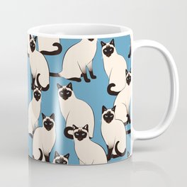 Siamese Cats crowd on blue Mug