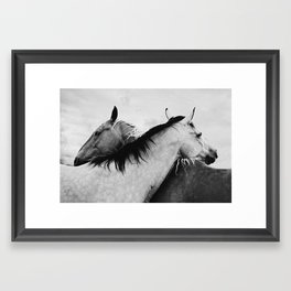 Hugging horses Framed Art Print