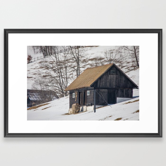 Old mountain house with Carpathian mountains in the background Framed Art Print