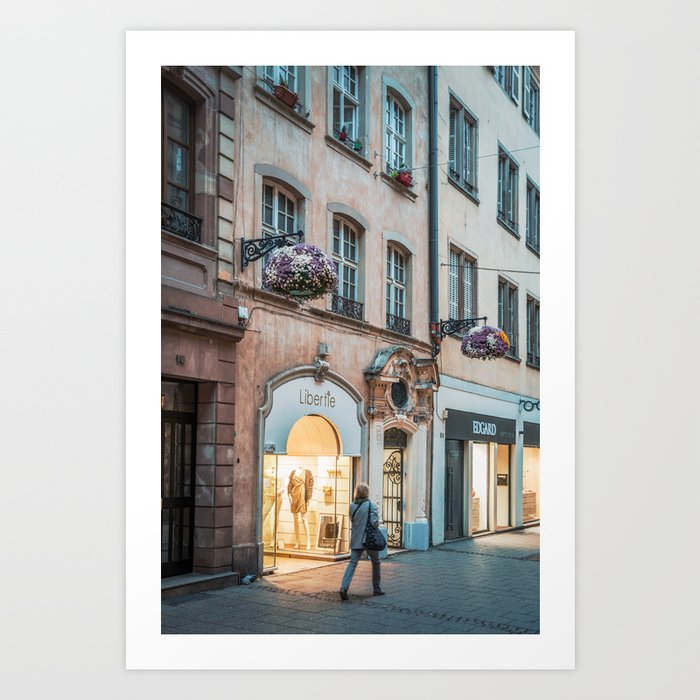 Woman walking by shops - Strasbourg Art Print