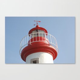 Lighthouse on a blue sky Canvas Print
