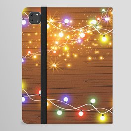 Christmas and New Year design: wooden background with Christmas lights of garland. Vintage illustration, Set of glowing christmas lights. Wooden background.  iPad Folio Case