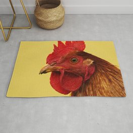 Portrait of brown young rooster on a yellow background - close up Area & Throw Rug