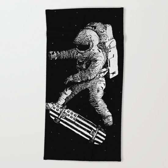 Kickflip in space Beach Towel
