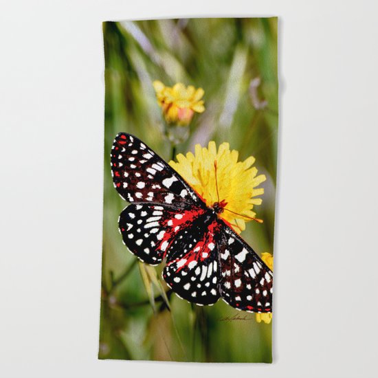 A Red Dotted Checkerspot Beach Towel
