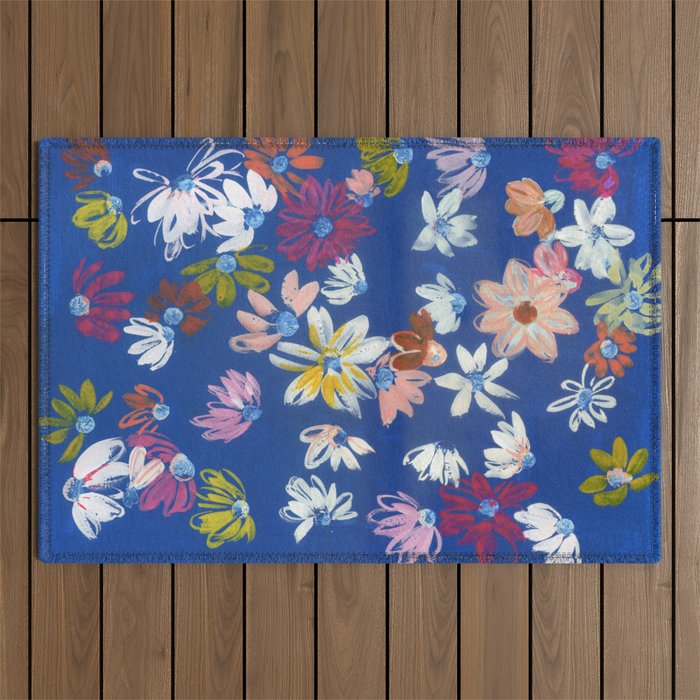 pink, white and yellow flowers on blue Outdoor Rug