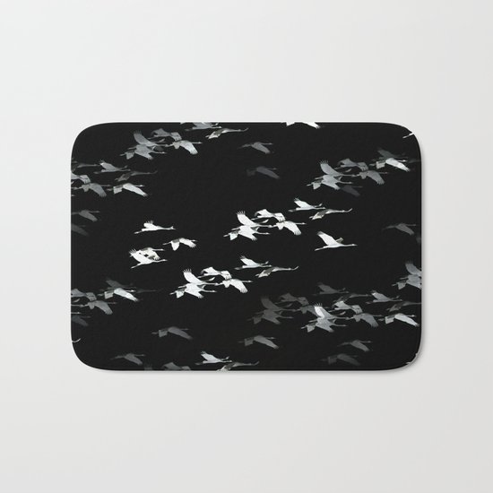 Abstract crane flock Bath Mat