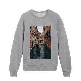 Venice Italy with gondola boats in canals surrounded by beautiful architecture Kids Crewneck