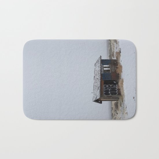Hopeless, Abandoned, and Alone Under Grey Snow Filled Sky Bath Mat