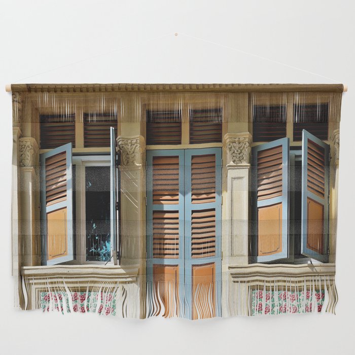 Traditional Singapore Peranakan or Straits Chinese shop house with decorative exterior and antique orange shutters in historic Geylang Wall Hanging