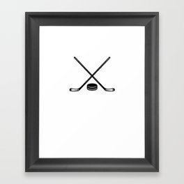 ice hockey bat and puck Framed Art Print
