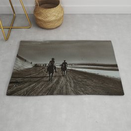 Young Couple Riding Horses at the Beach Rug