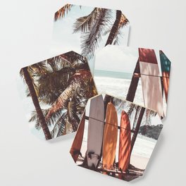 Surfboard and palm tree on the beach. Summer travel sport. Vintage tone filter effect. Coaster
