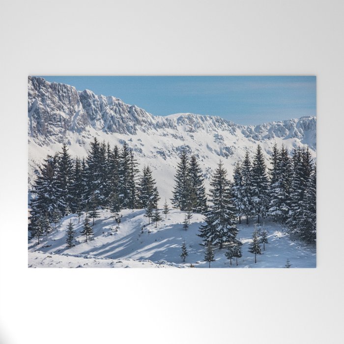 Winter landscape with snow-covered fir trees Welcome Mat