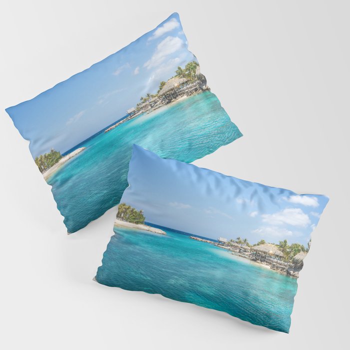 Blue water lake with huts and palm trees around Pillow Sham