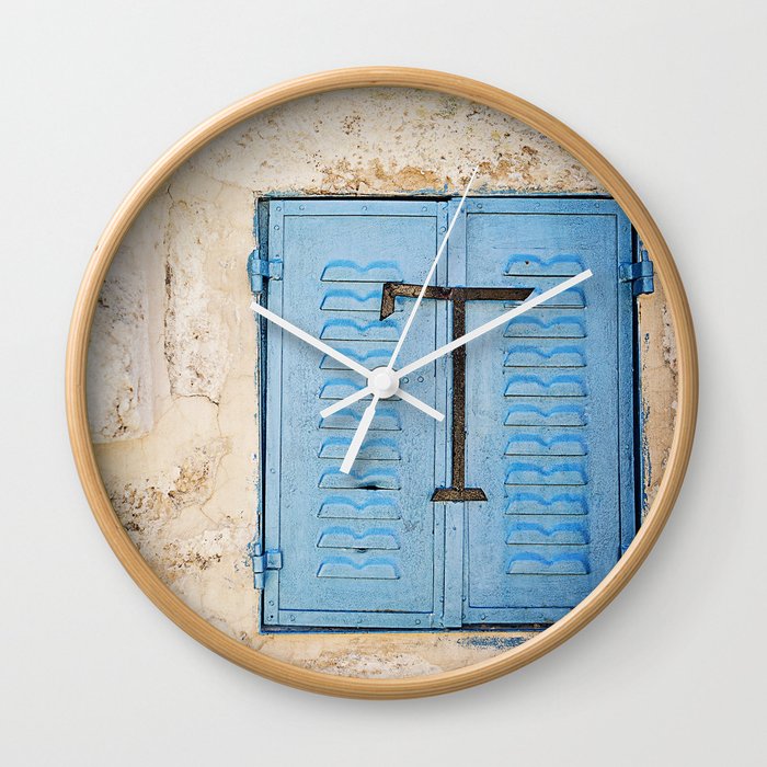 Vibrant Blue Window in Stone Wall Wall Clock