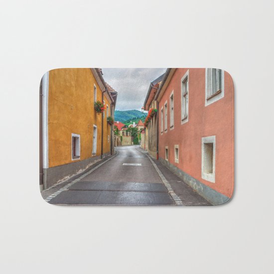 Geraniums all in a Row Bath Mat