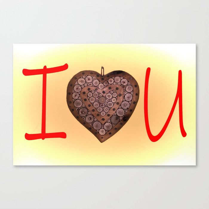 heart in inarsiated wood to form the inscription I Love You Canvas Print